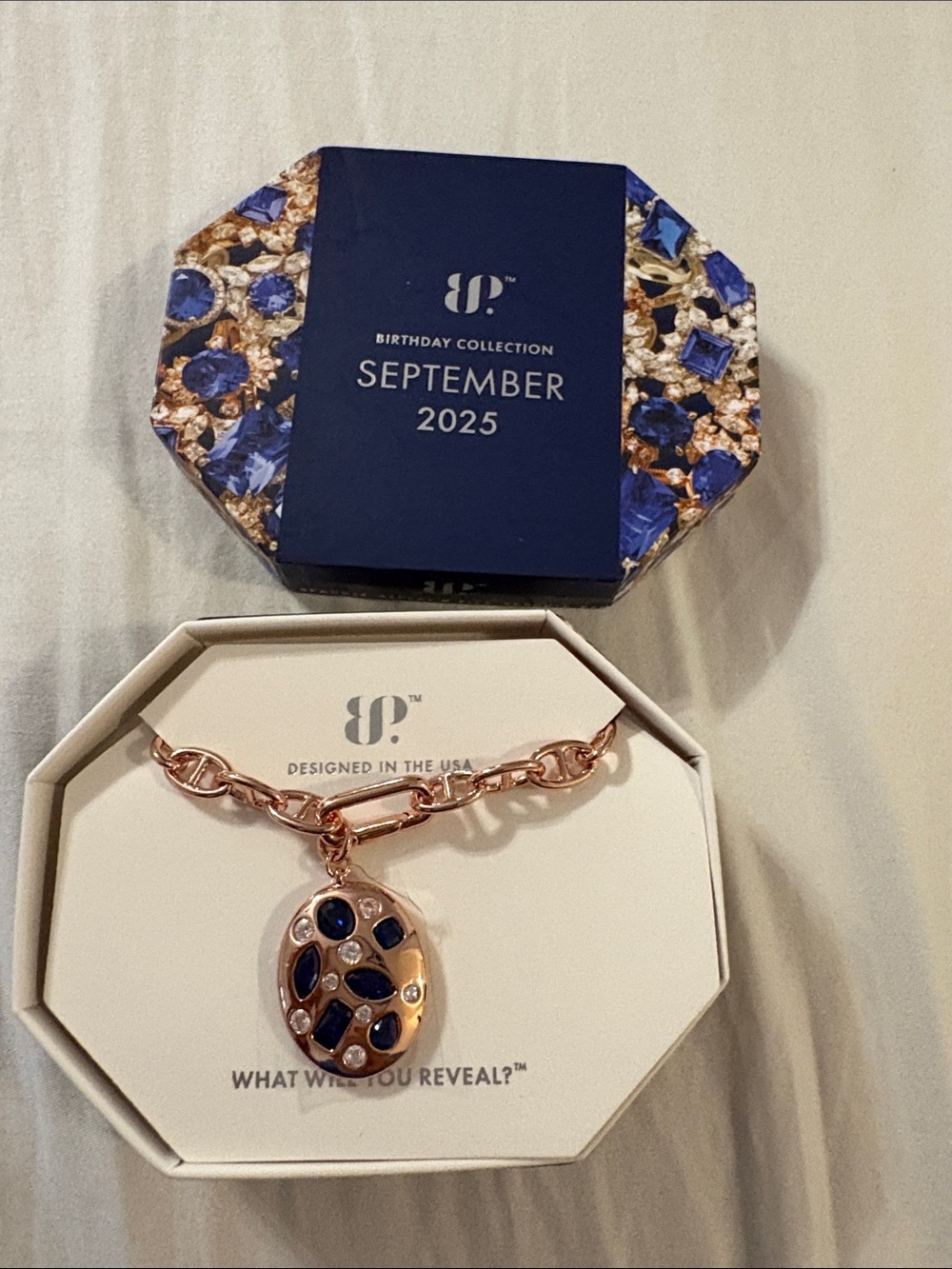 September Birthstone Rose Gold Charm Necklace with Sapphire Blue Stones